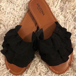 Adorable black ruffled tiered slip on sandals
